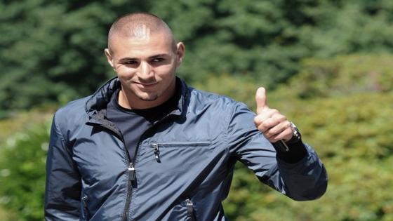 French forward Karim Benzema arrives at the French football team training base in Clairefontaine, near Paris, on August 9, 2010, two days before the friendly match opposing Norvege to France. AFP PHOTO / BERTRAND GUAY (Photo credit should read BERTRAND GUAY/AFP/Getty Images)